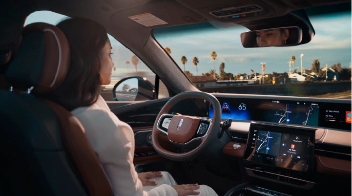 A person is shown driving hands-free on the highway with available Lincoln BlueCruise technology. | North Park Lincoln in San Antonio TX