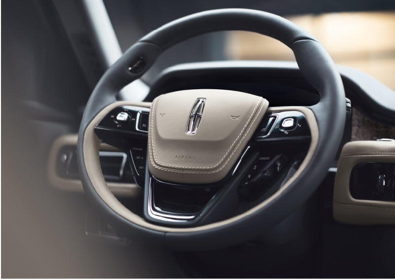 The intuitively placed controls of the steering wheel on a 2023 Lincoln Aviator® SUV | North Park Lincoln in San Antonio TX