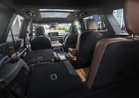 One side of the PowerFold® third-row seat and a second-row seat are folded forward in the 2026 Lincoln Aviator® SUV. | North Park Lincoln in San Antonio TX